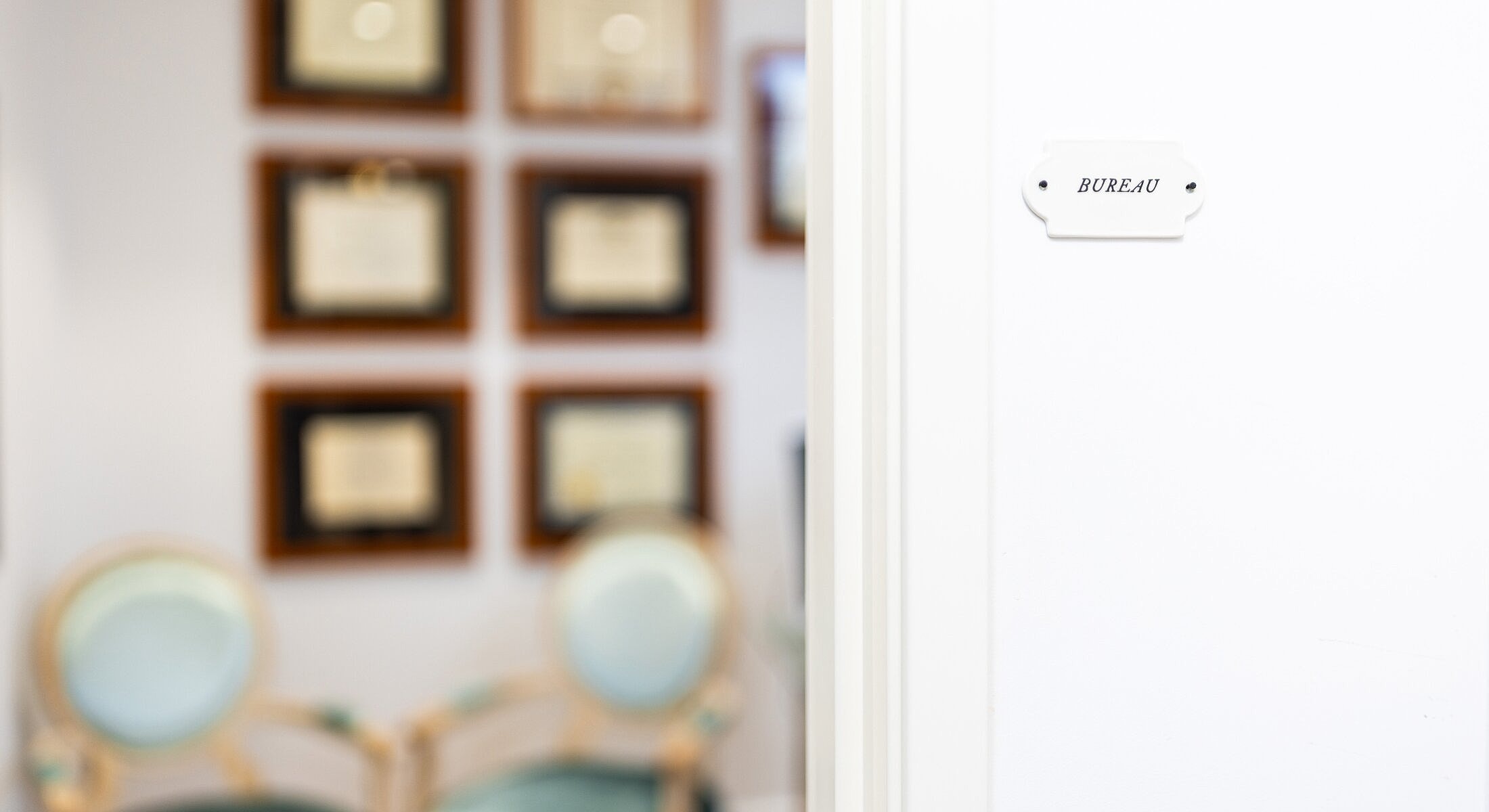 Office door with "BUREAU" sign displayed.