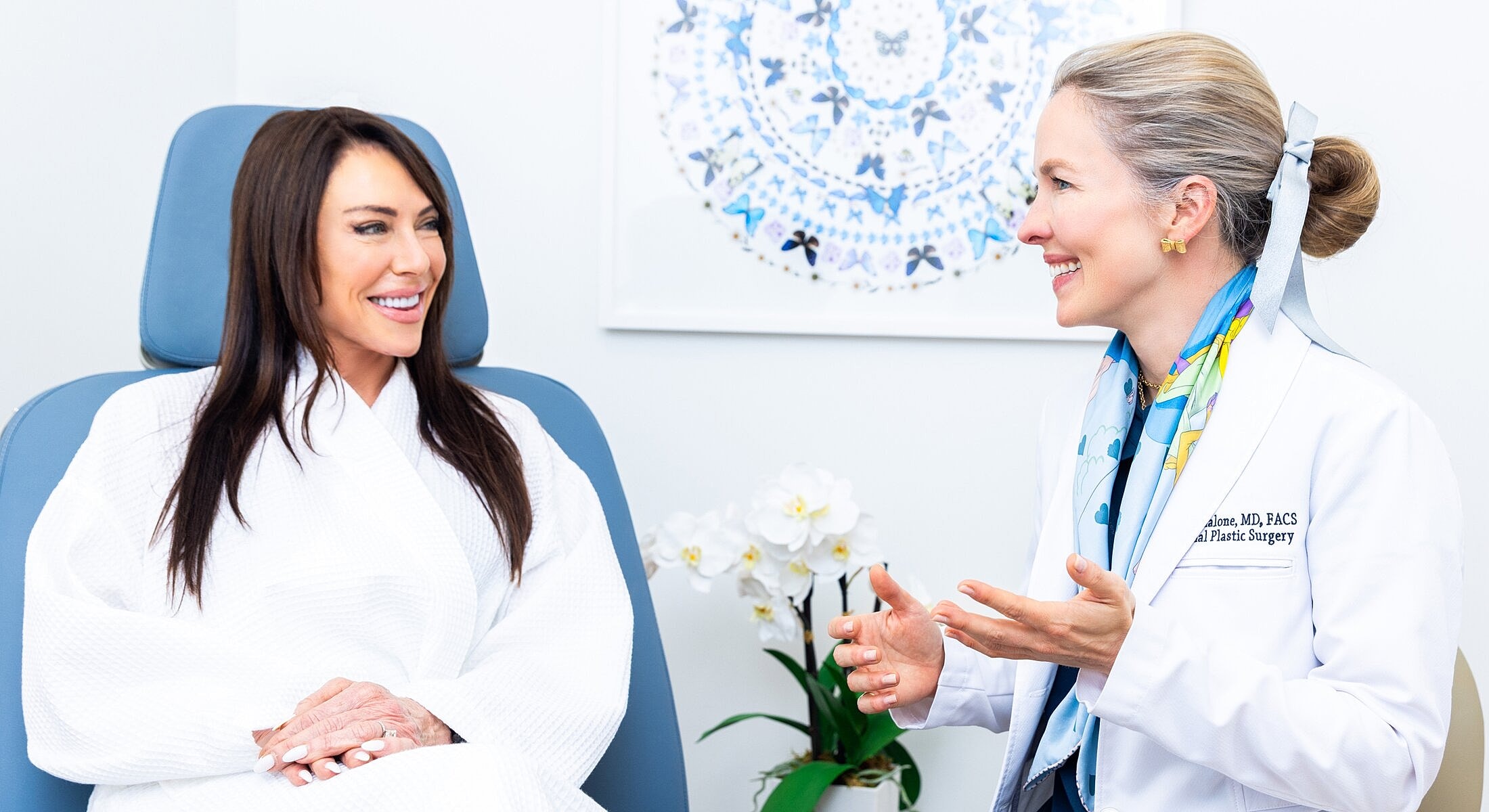 Doctor consulting with patient in medical office.